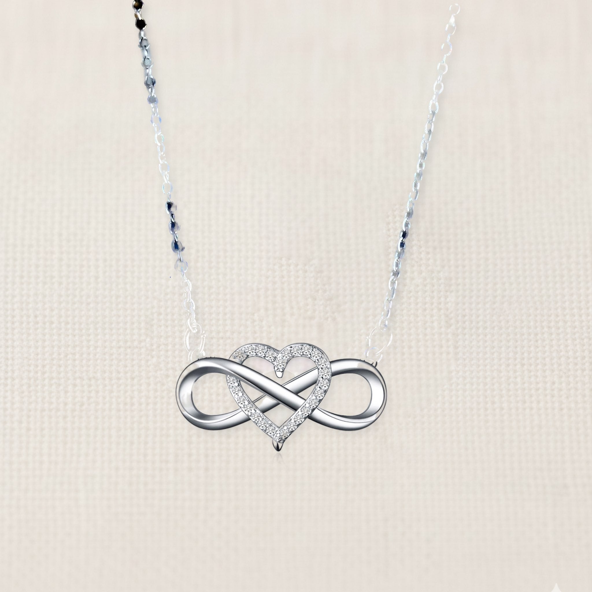 Bezelle Infinity Holder sterling silver necklace with charm loop