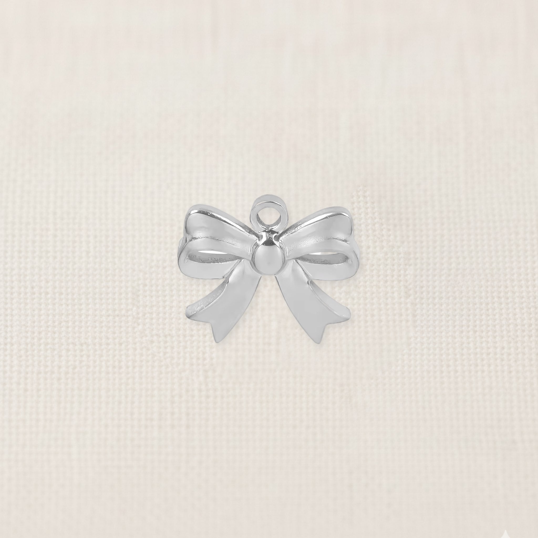 Bezelle Keepsake Bow charm in sterling silver