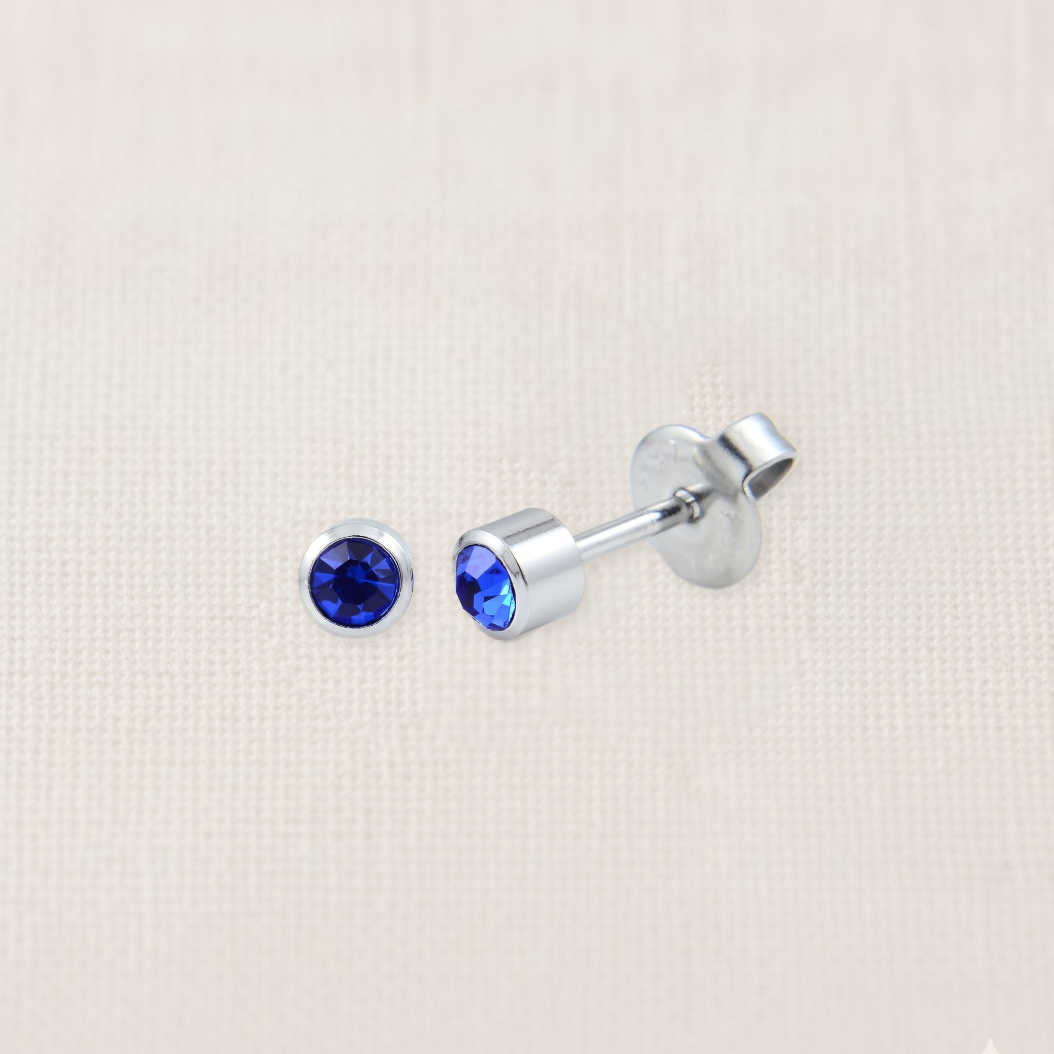 Bezelle Lustre Studs with lab-created sapphire in sterling silver, 5mm birthstone earrings
