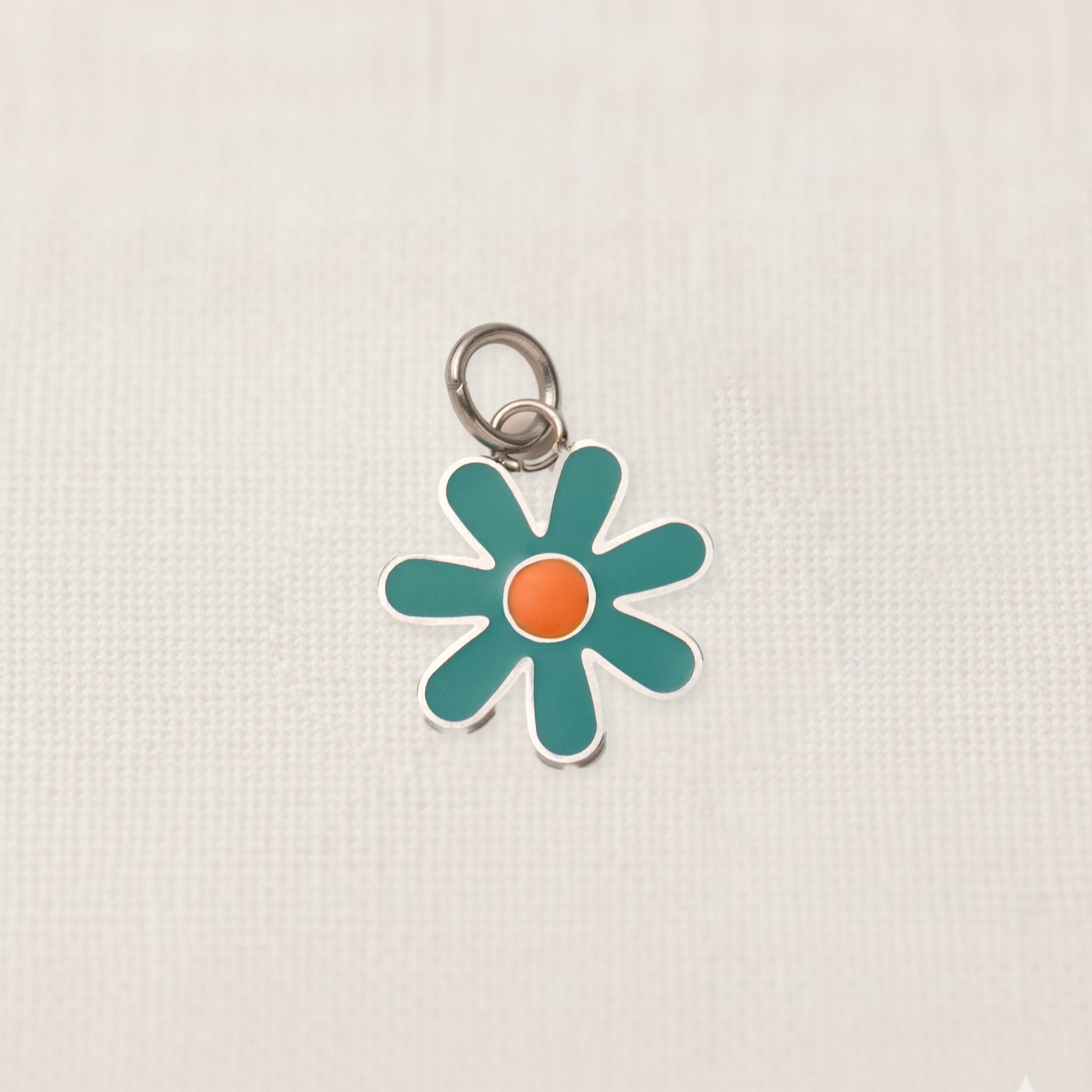Bezelle Petal Bloom flower enamel charm in light teal